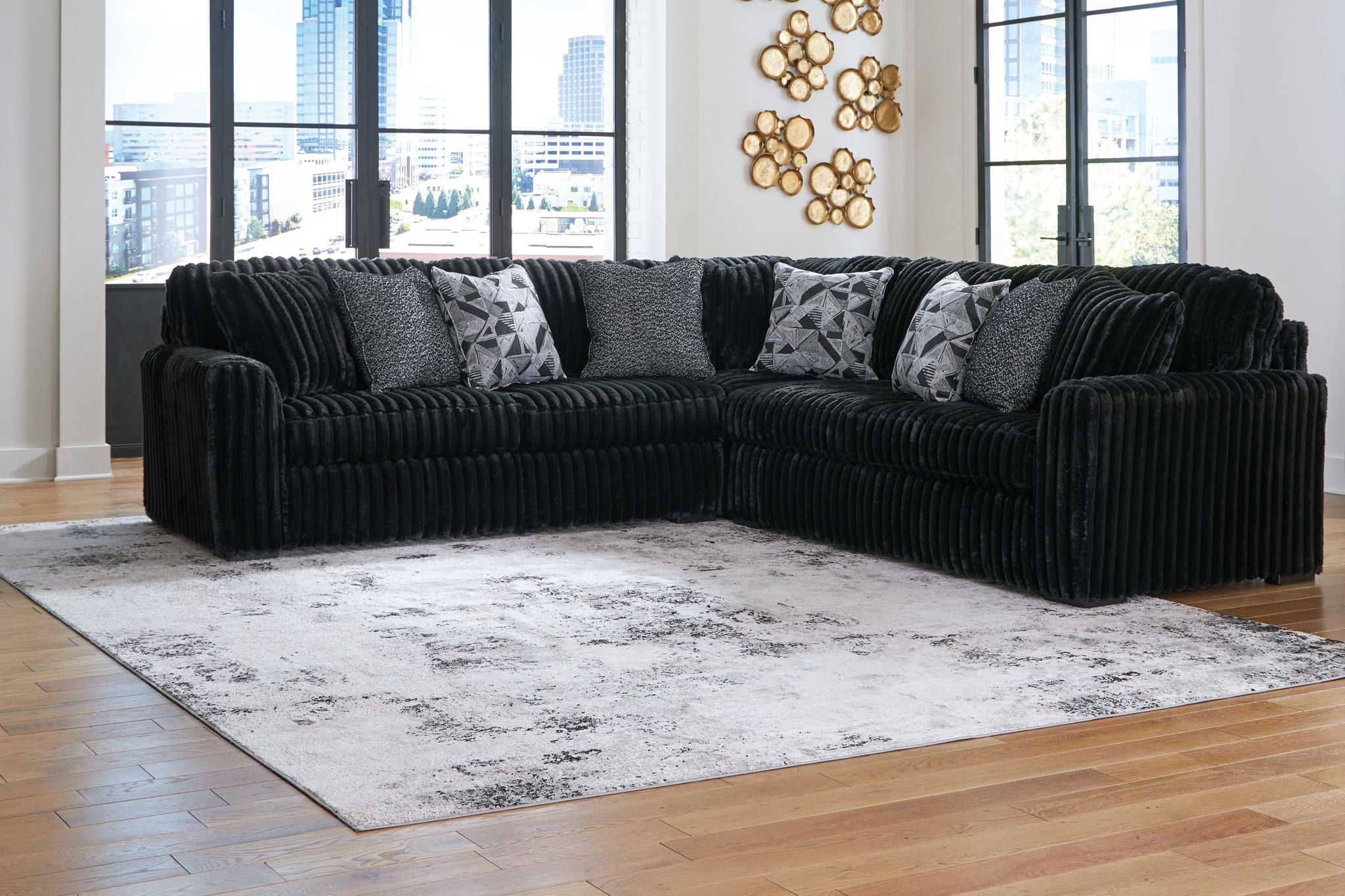 Midnight-Madness - 4 Pc. - 3-Piece Sectional, Ottoman - Onyx
