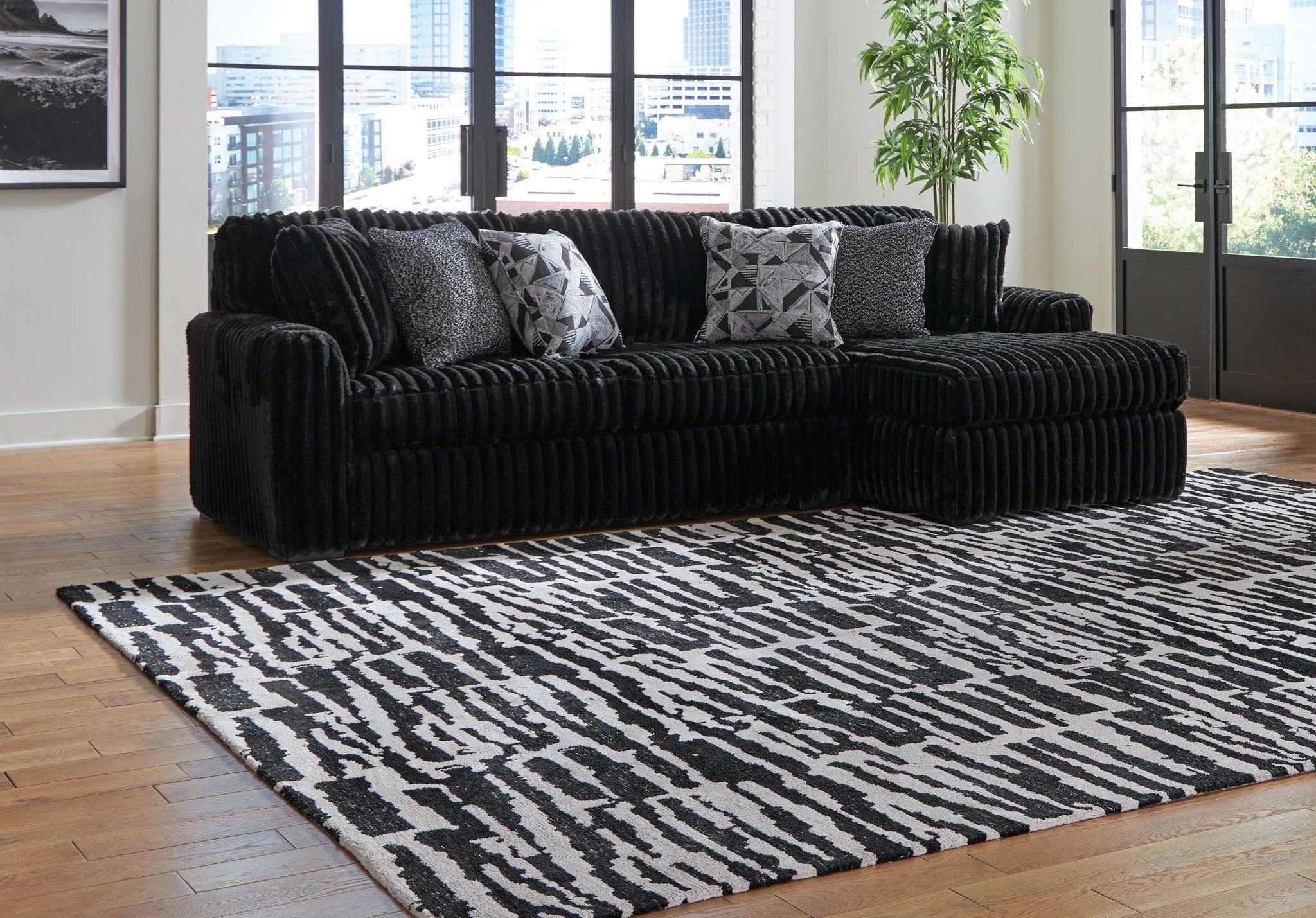 Midnight-Madness - 4 Pc. - 2-Piece Sectional Sofa With Raf Corner Chaise, Chaise, Ottoman - Onyx