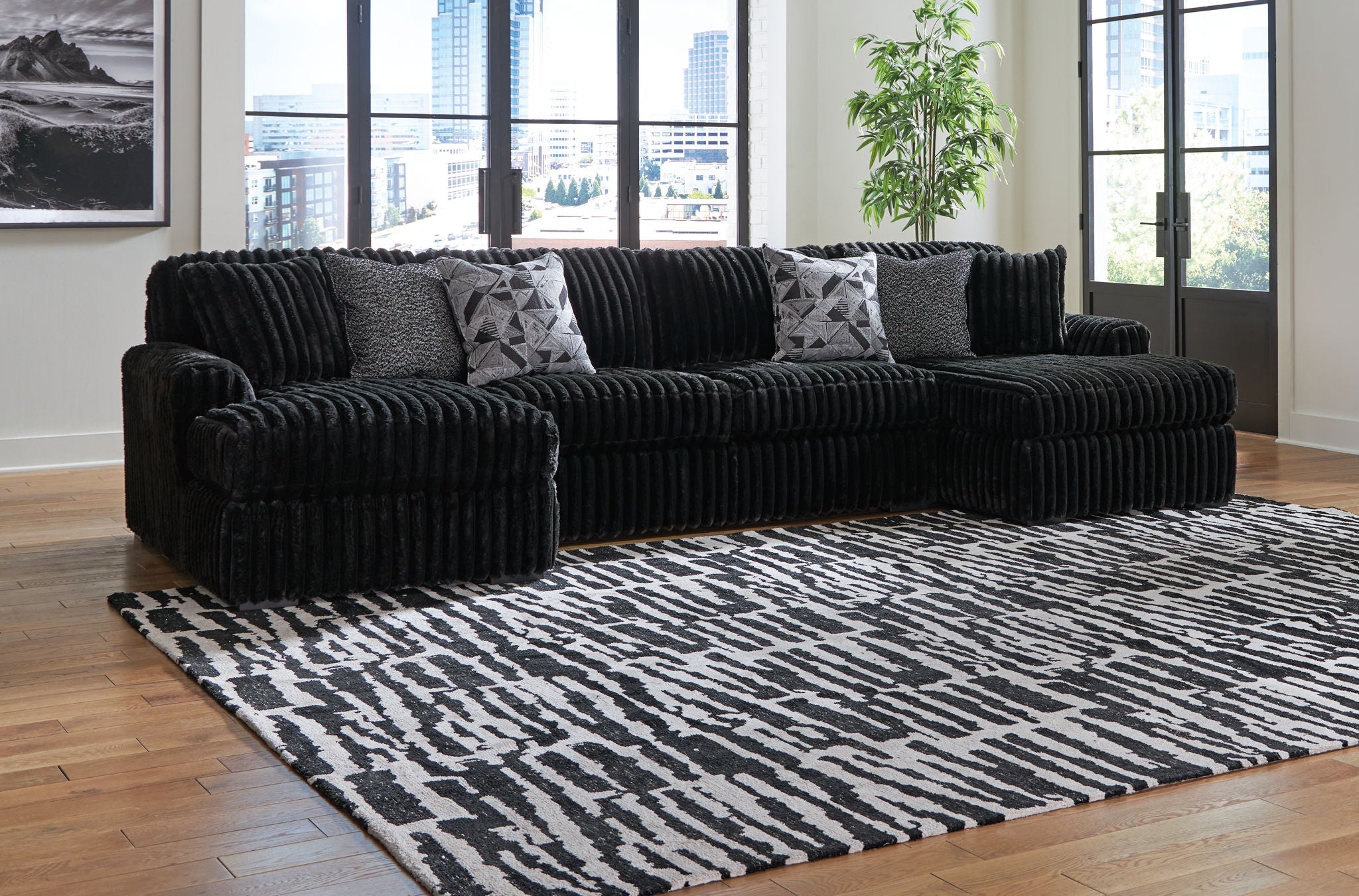 Midnight-Madness - 4 Pc. - 3-Piece Sectional With Laf And Raf Corner Chaises, Ottoman - Onyx